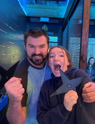 Aaron with a woman holding throwing stars