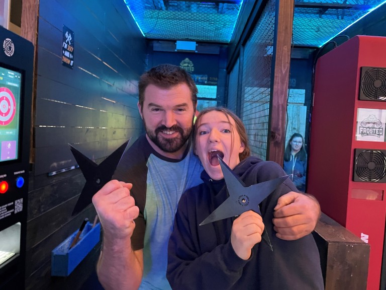 Aaron with a woman holding throwing stars