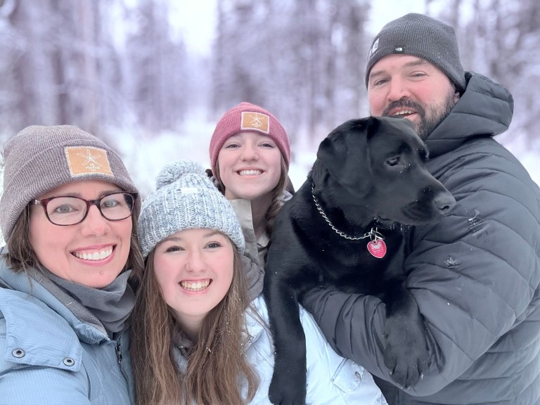 Aaron with his family and a dog