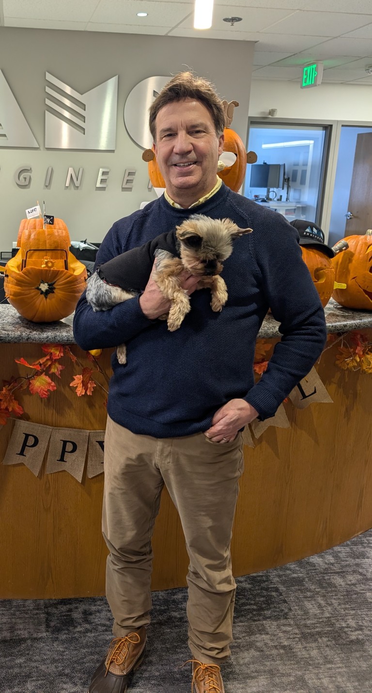 Dave holding Yorkshire terrier dog