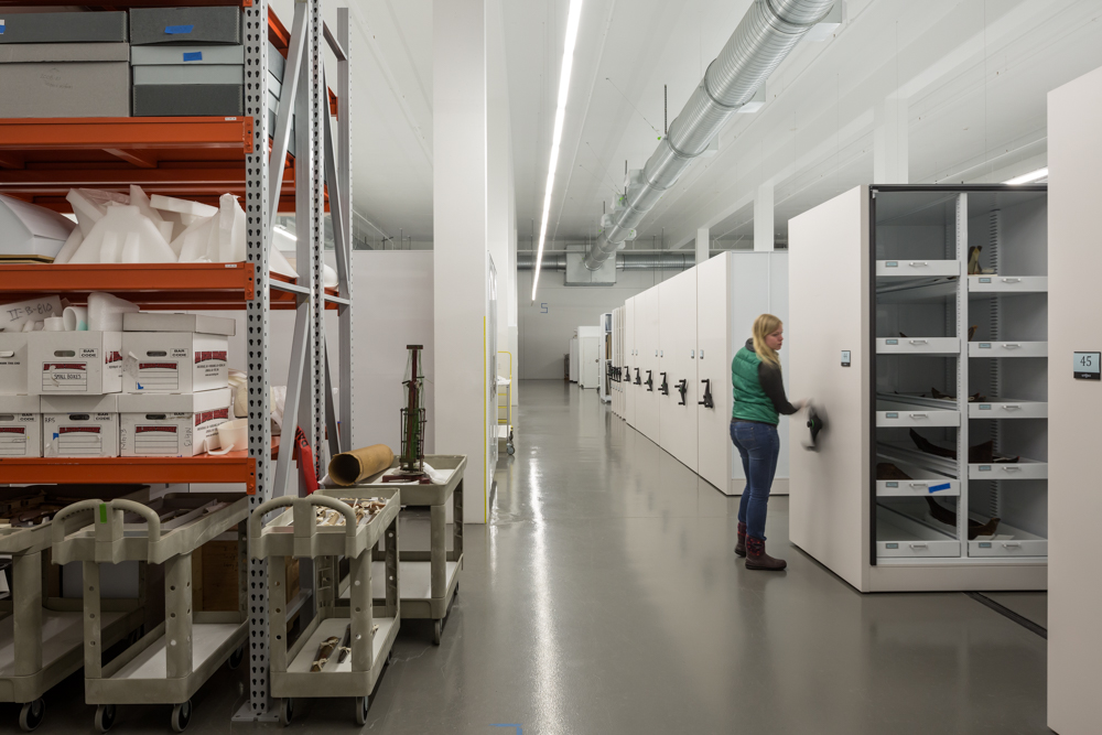 Bright lighting and visible air ducts in records room