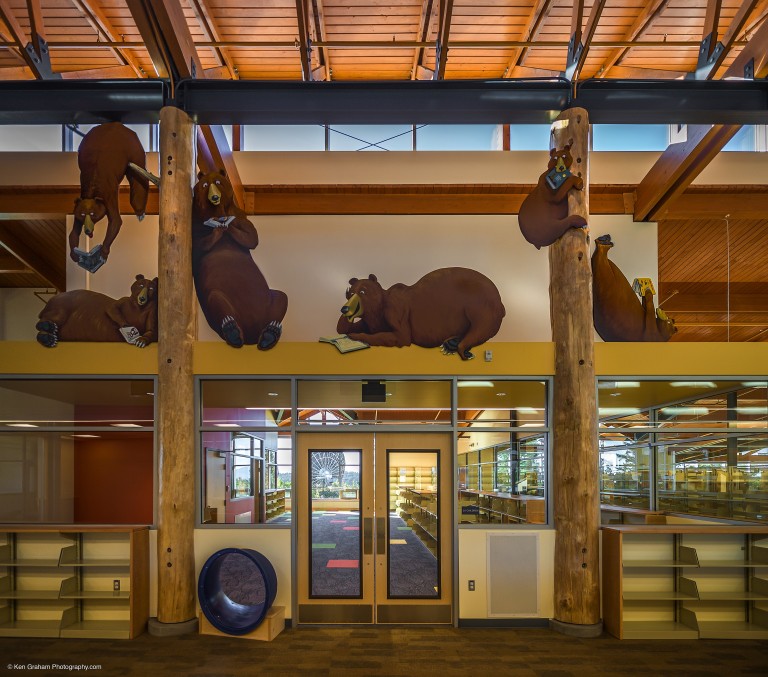 Decorative entryway to library with bear cut outs