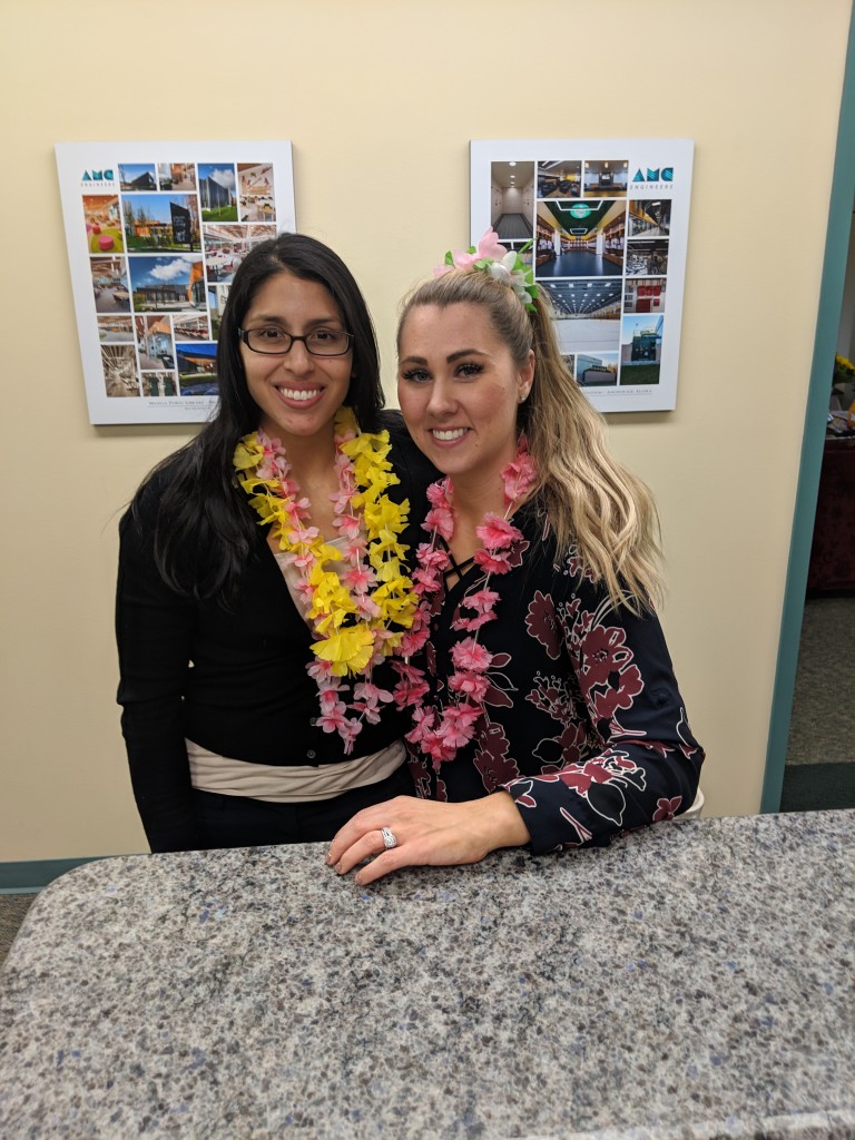 Michelle Pasion and woman wearing leis