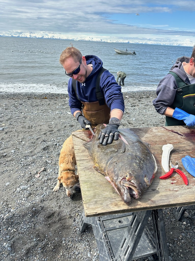 Bart cutting a large fish