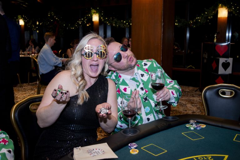 Brittany and man in casino at table