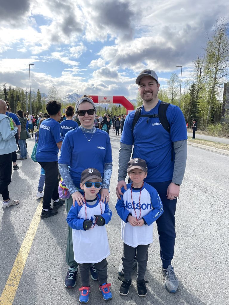 Christian with his family at a race