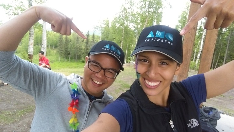 Deborah posing with another AMC employee at a company event