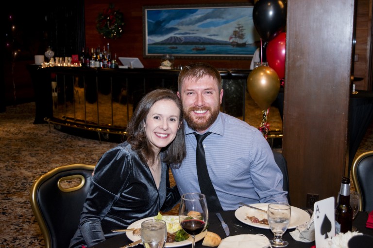 A man and woman at an upscale dinner