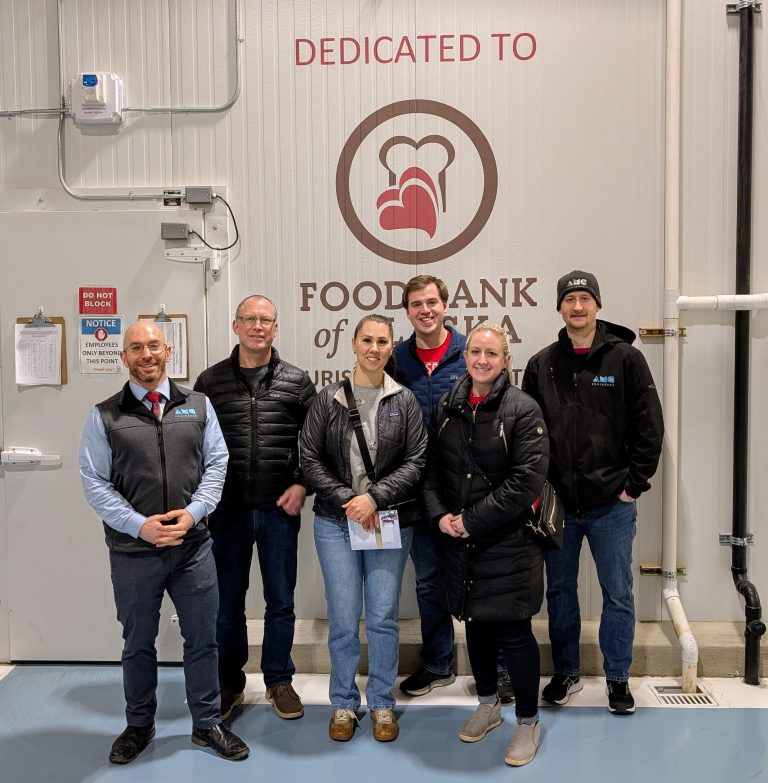 AMC employees in front of the Food Bank of Alaska