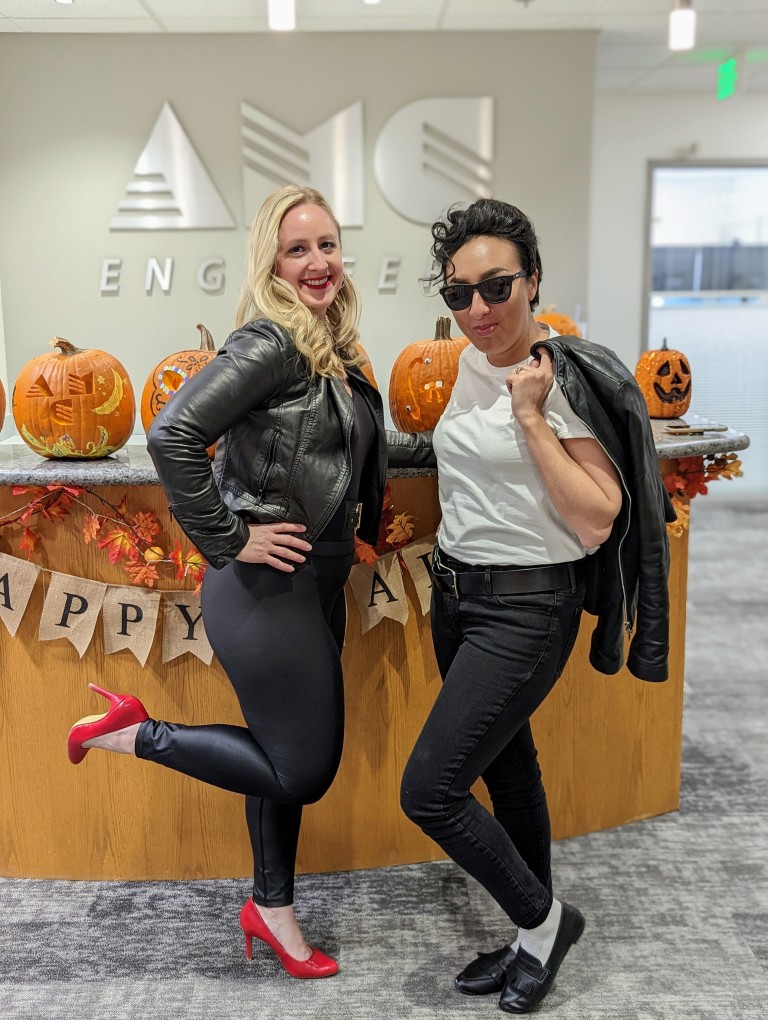 Two AMC employees in halloween costumes