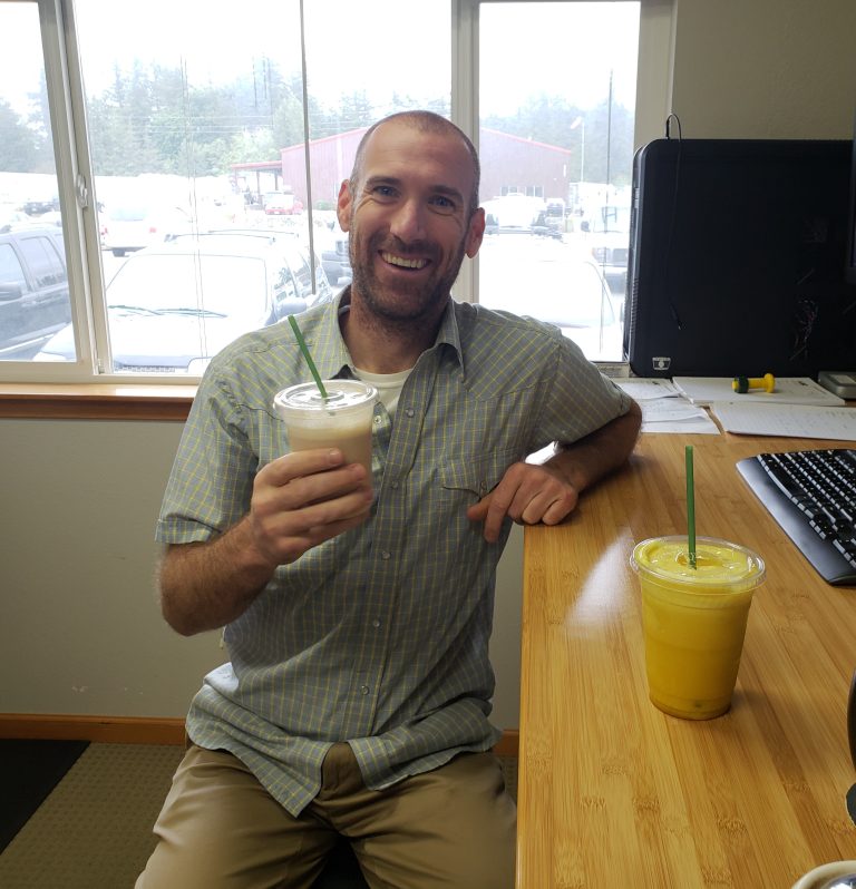 John holding a drink