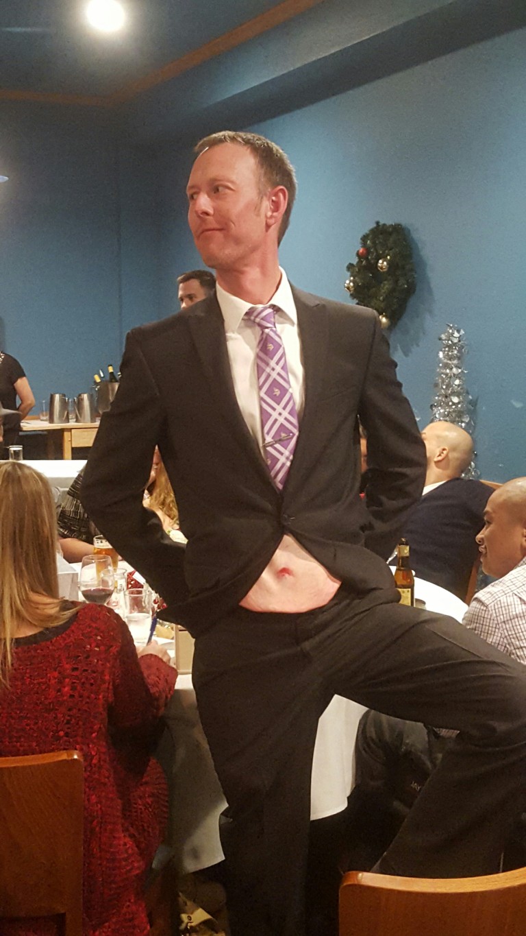 Matt Olson posing in suit