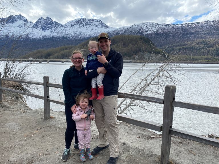 Trenton and a woman with two children