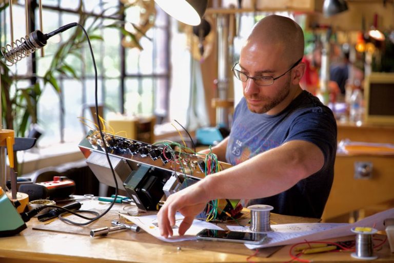 David working on a piece of electric machinery