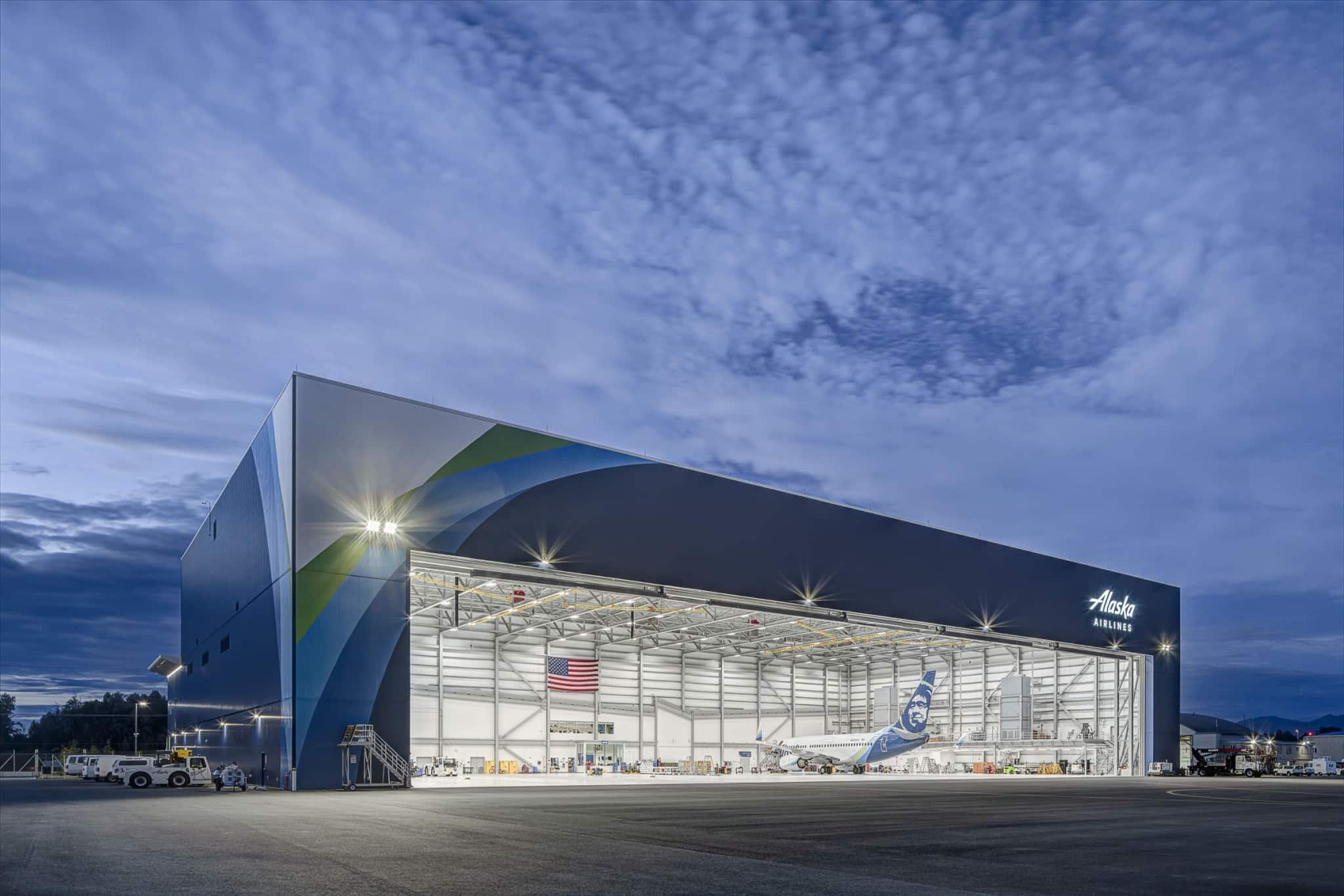 Brightly lit airline hangar