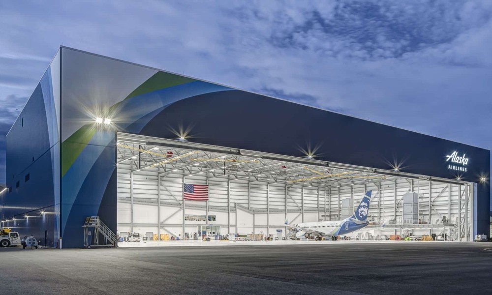 Brightly lit airline hangar