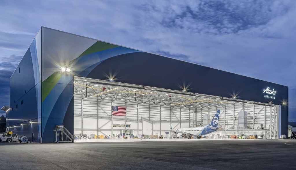 Brightly lit airline hangar