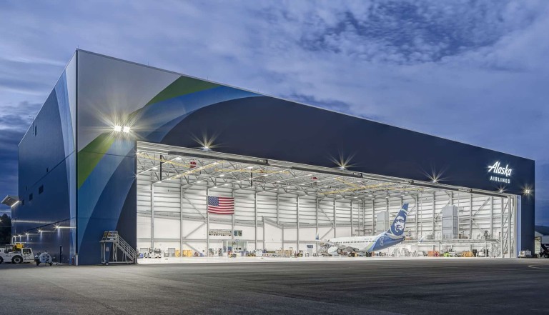 Brightly lit airline hangar
