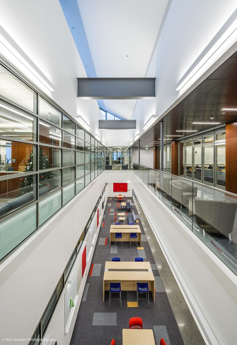 View of downstairs tables from a balcony