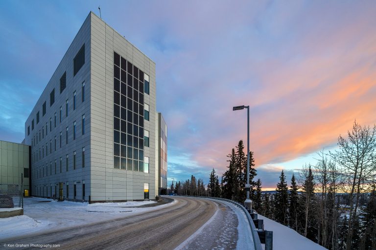 Multistory tiled building along mountain edge