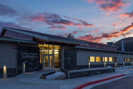 One story building with stone and paneled walls