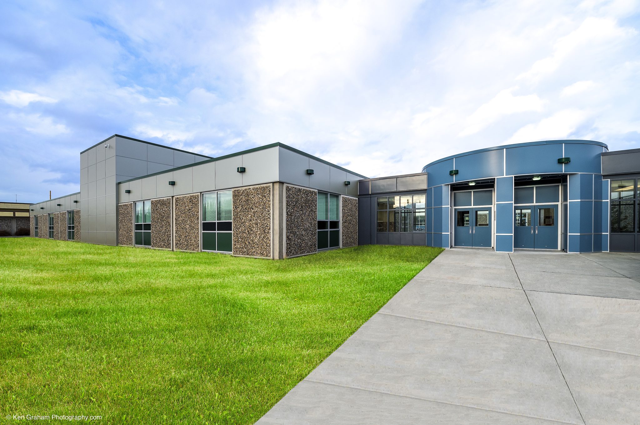 One story building with colorful tile walls
