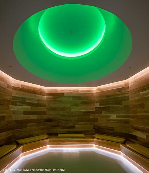 Room with decorate green and white lighting