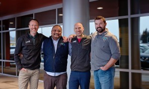 Multiple AMC employees smiling together