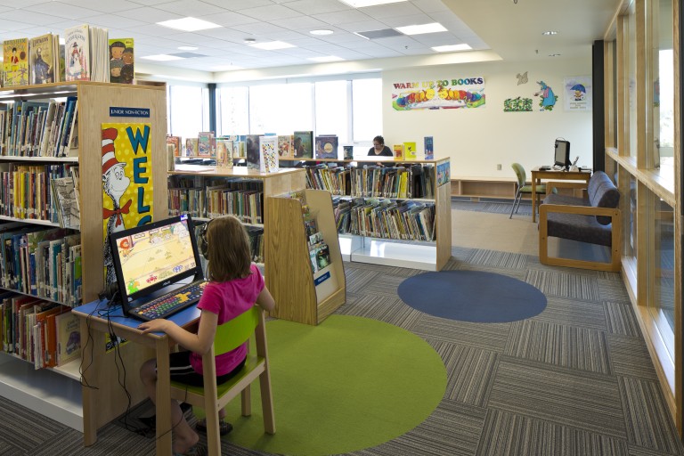 Brightly lit children section of library