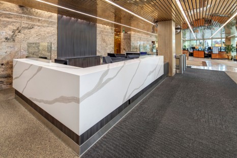 Brightly lit decadent marble receptionist desk