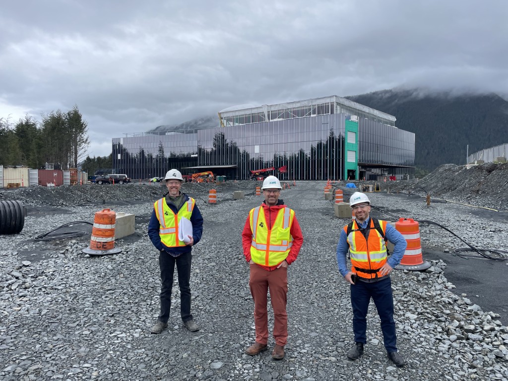 AMC employees in safety gear on construction site