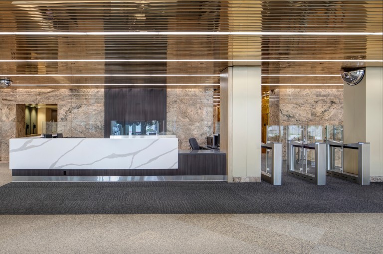 Receptionist desk with gated entryways