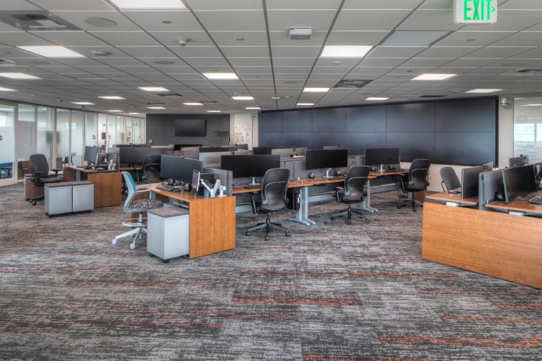 Computer room with wall full of TVs