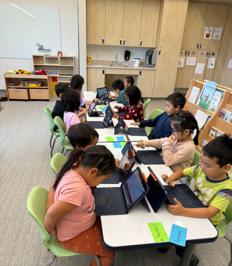 Children on tablets in school