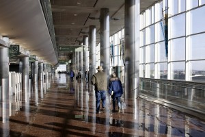 People walking down corridors in airport