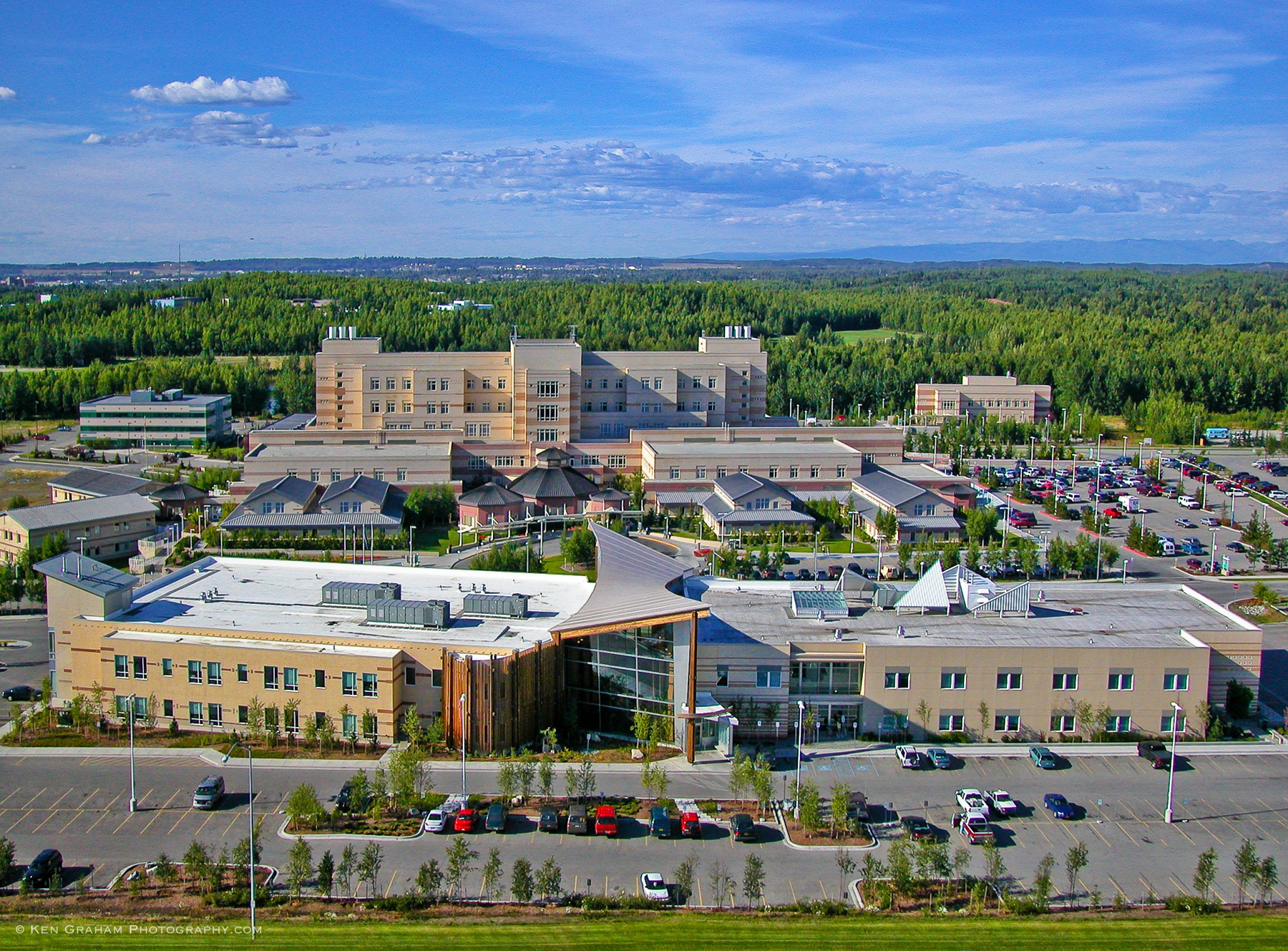 Aerial shot of medical center complex buildings and parking lots