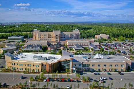 Aerial shot of medical center complex buildings and parking lots