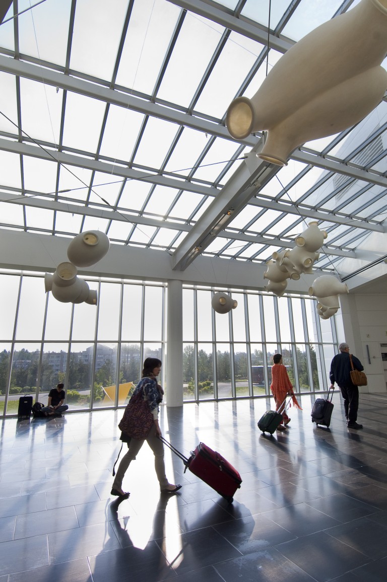 Decorative sculpture lighting in airport walkway