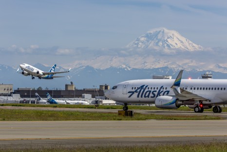 Airplanes taking off from runway