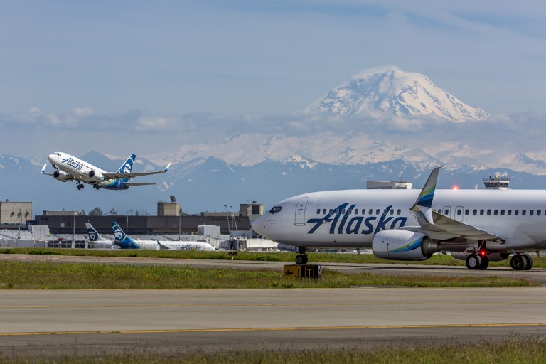 Airplanes taking off from runway