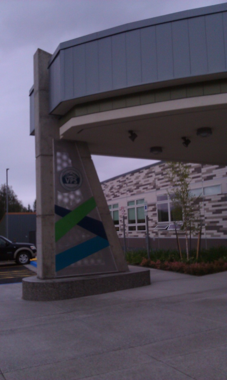 Decorative column and lighting on exterior of building