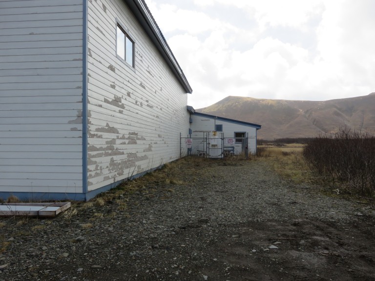 Mechanical systems outside of wooden slab building