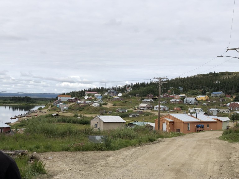 Buildings and wooded hills along coast