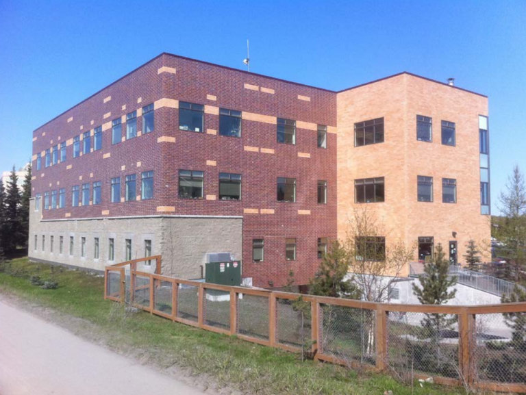 Red and cream brick multistory building